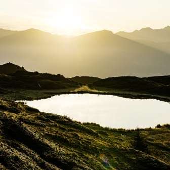 Sonnenaufgang beim Pascuminersee am Heinzenberg