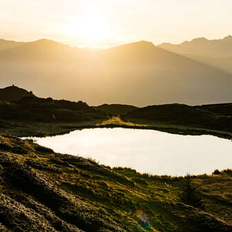 Sonnenaufgang beim Pascuminersee am Heinzenberg